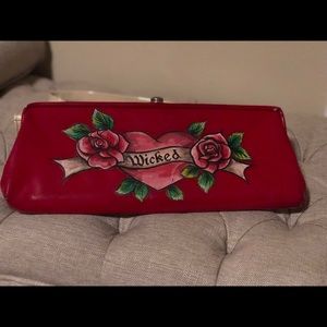 One of a kind, hand painted red vintage clutch